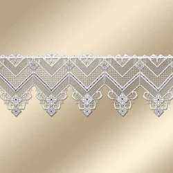 Kleinfenstergardine Venka vor goldenem Hintergrund