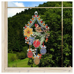 Fensterdeko Stieglitz mit Frühlingsblüten Beispiel am Fenster