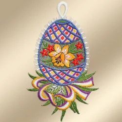 Fensterdeko Osterei mit Narzisse vor goldenem Hintergrund