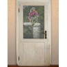 Fensterbild Allium helllila an einer Tür dekoriert
