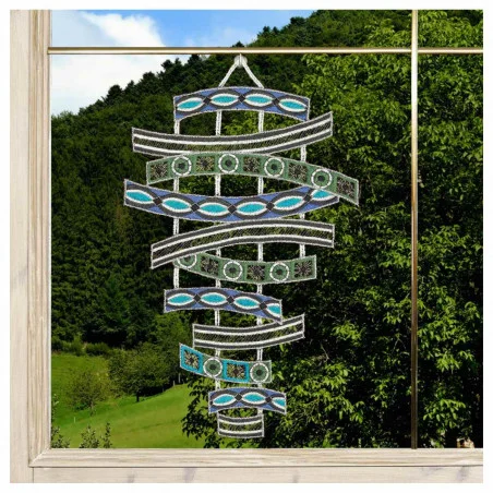 Fensterbild Tamaya in blau-grün Beispielbild am Fenster